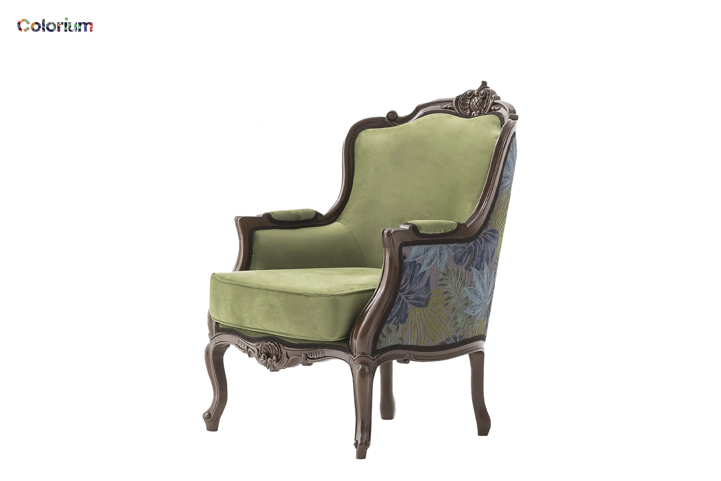 Elegant vintage armchair with carved wooden frame, green velvet upholstery, and floral fabric sides, perfect for luxurious and classic living spaces.