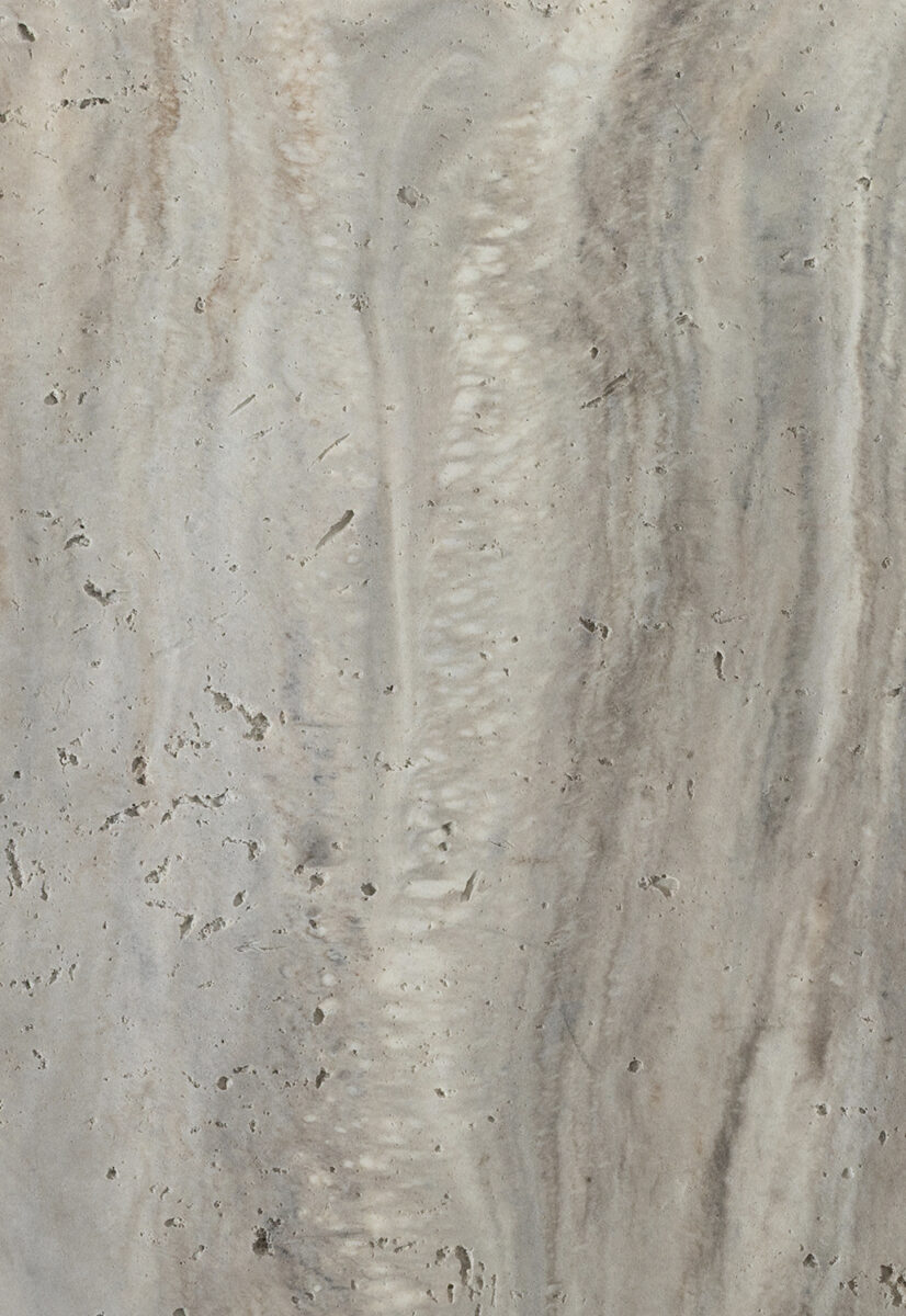 Natural stone tile surface with beige and light gray marbling for sophisticated home or commercial decor.