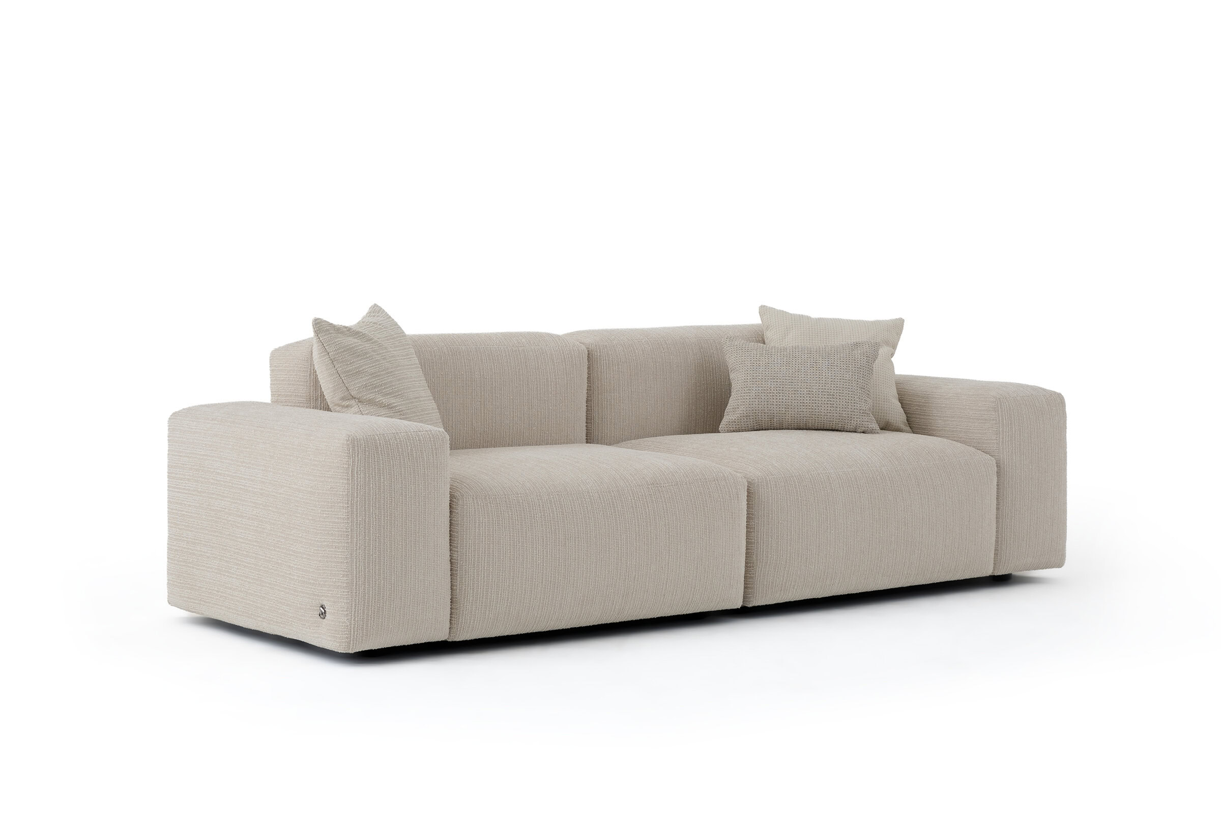 Elegant beige sofa with plush cushions, perfect for contemporary living rooms, offering comfort and style.