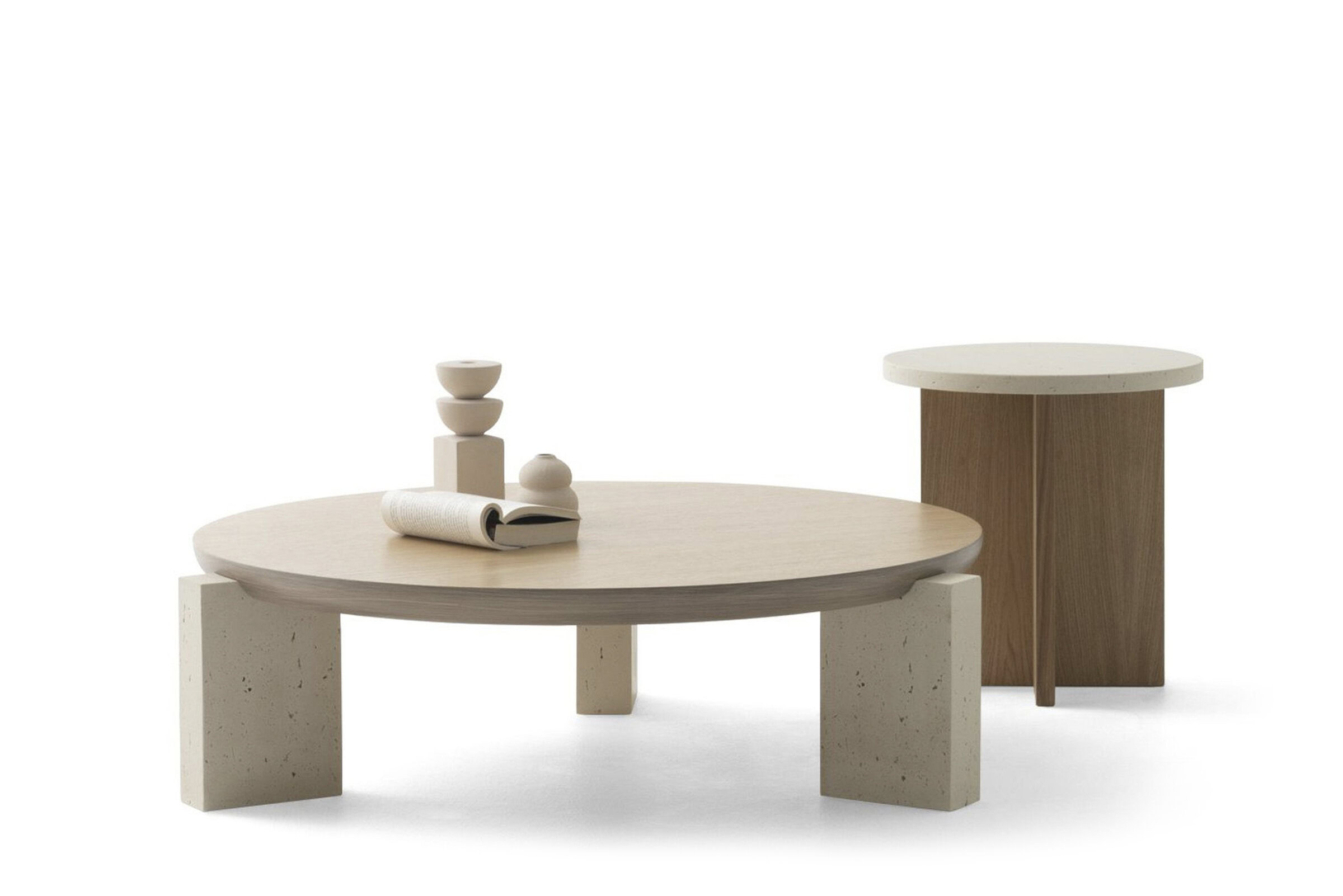 Sleek modern coffee table with wooden top and concrete legs, complemented by a matching side table and minimalistic decor for contemporary living spaces.